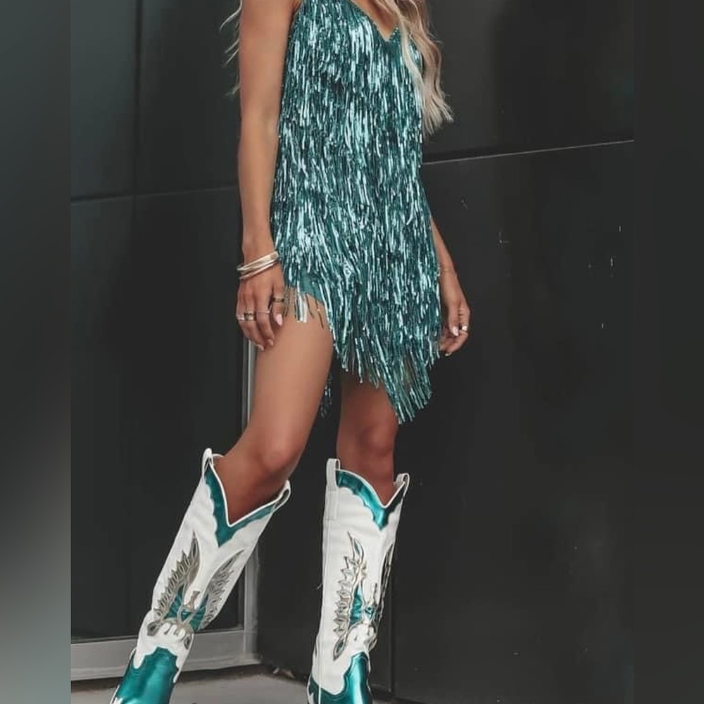 Mini fringe dress !!! Turnin heads!! Multiple sizes and colors . Message me